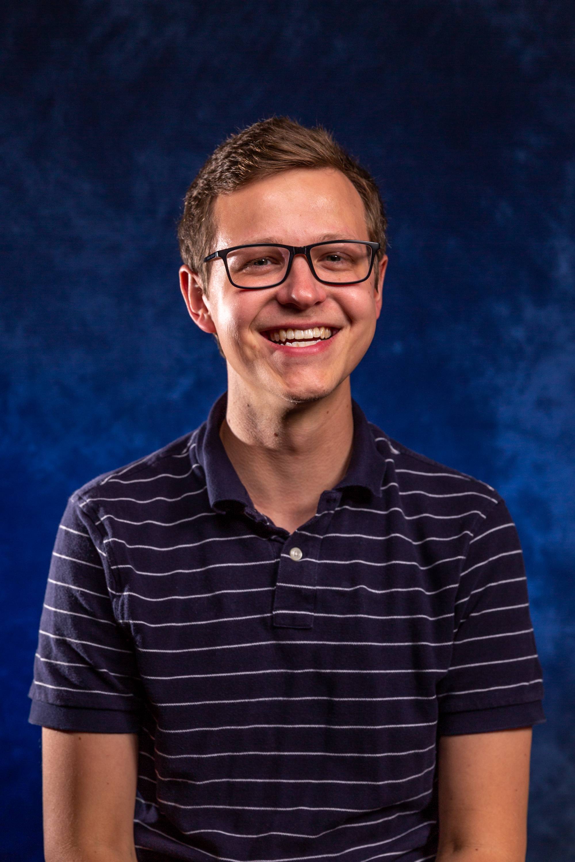 Bobby Nielsen sample head-shot in front of dark blue background
